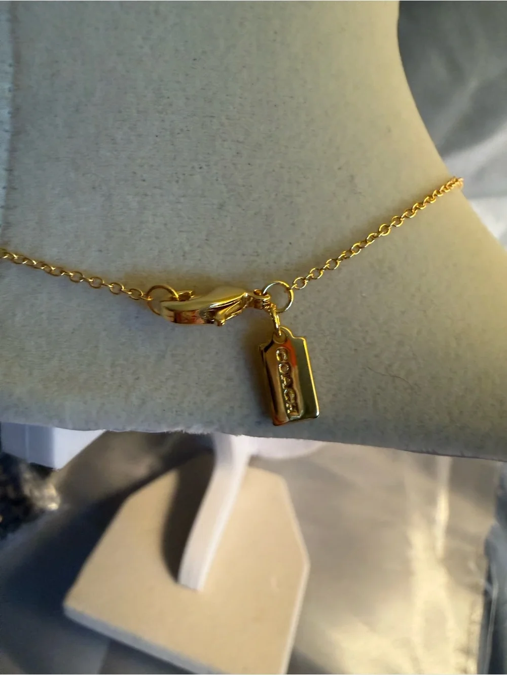 Coach Gold Bow Necklace with Multicolored Stones